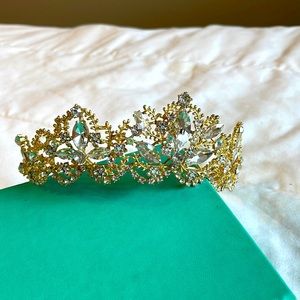 Gold colored metal and crystal tiara